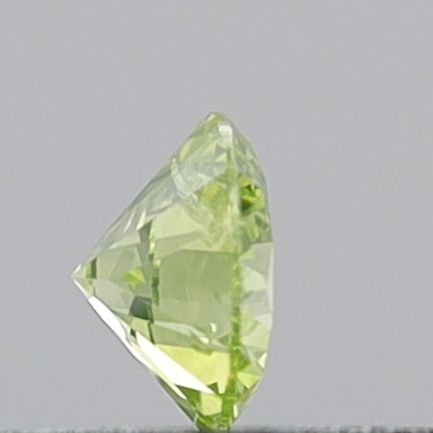 0.24 Carat Round Brilliant Natural Fancy Intense Greenish Yellow I1